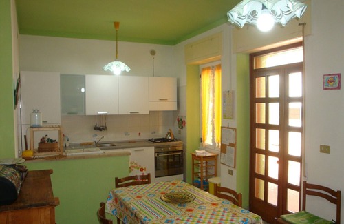 Cala Gonone Apartment | Bright and comfortable apartment, 400 meters from sea. Garden, Air-Con,Terrace.