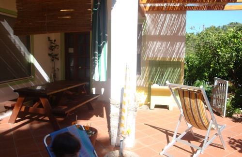 Cala Gonone Apartment | Bright and comfortable apartment, 400 meters from sea. Garden, Air-Con,Terrace.