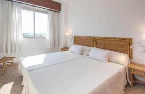 Mareny Blau Apartment | Bright Apartment Steps Away from the Beach