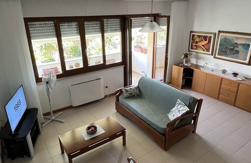 Fertilia Apartment | BRIGHT APARTMENT WITHIN WALKING DISTANCE FROM THE SEA