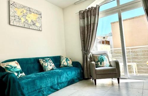 Qawra Apartment | Bright & Central with Parking, Indoor Pool & Gym