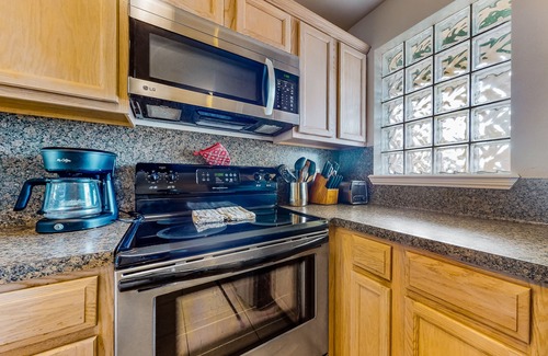 South Padre Island Condo | Bright & Contemporary Home with Shared Pool & Central Location