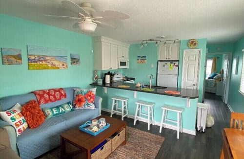 North Carolina Coast Condo | Bright end unit, Ocean Views, 1st floor, Pool, Double Decks, Keyless Entry