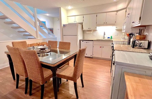 Port St. Joe House | Bright end unit across from pool -steps to beach ramp -beach chairs & cart incl.