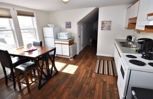 Vernon Apartment | Bright One Bedroom Suite Has Peaked Ceilings with Tons of Character