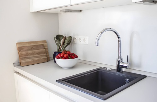 Fehmarn Apartment | Bright Stuuv – Comfortable Living with Sunny Terrace and Fireplace