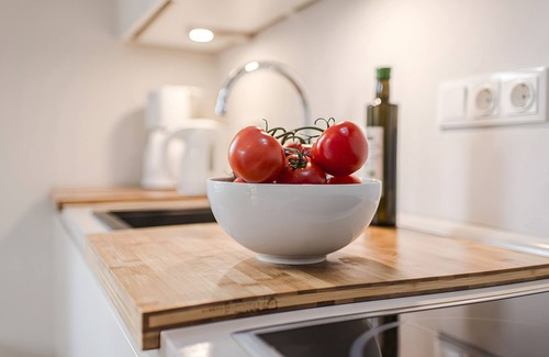 Fehmarn Apartment | Bright Stuuv – Comfortable Living with Sunny Terrace and Fireplace