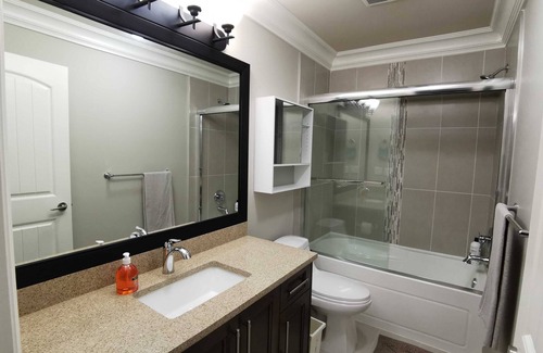 Coquitlam House | Bright suite with two bathrooms for added convenience and privacy.