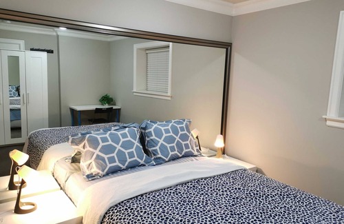 Coquitlam House | Bright suite with two bathrooms for added convenience and privacy.