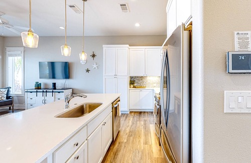 Rockport Villa | Bright waterfront villa with pool, boat slip, patio & balcony in gated community