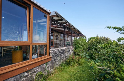 Llanybri Cottage | Brofallen - gorgeous barn conversion with incredible sea views