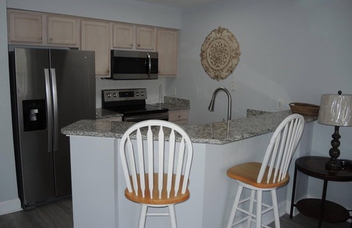 Calabash Condo | Brunswick Plantation Resort and Golf Condo 307M with Outdoor Pool by RedAwning