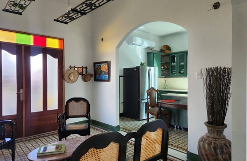 Arecibo Pueblo House | Built in 1942 and recently restored. Natural light and green lush vegetation.