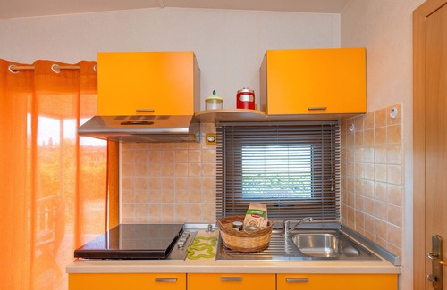 Bibbona House | Bungalow 'Stella 1' with Shared Pool, Private Terrace and Air Conditioning