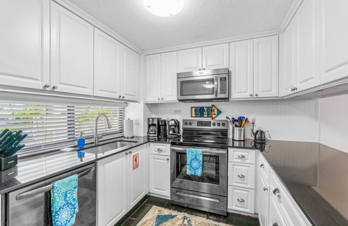 The Cove House | BY THE SEA VACATION VILLAS 2 BED/POOL/TWO BLOCKS TO BEACH/PRIVATE DECK