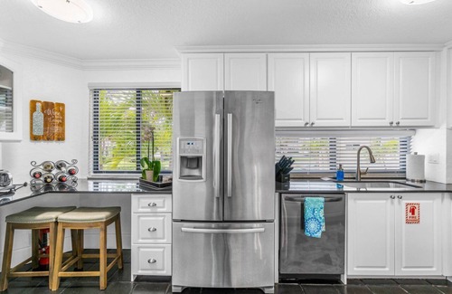 The Cove House | BY THE SEA VACATION VILLAS 2 BED/POOL/TWO BLOCKS TO BEACH/PRIVATE DECK