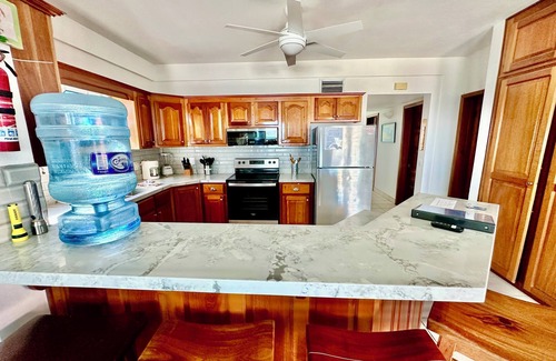 San Pedro Condo | C1 Step from your condo on to the beach! Pool, bikes, kayaks, more!