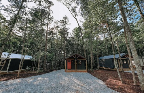 Hartwell RV Rental | Cabin #3: One king-size bed, a full kitchen, and a large gravel parking pad beside the cabin for easy boat or trailer storage.