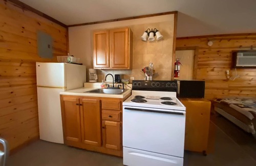 Warsaw Cabin | Cabin 4 - Reel and Trigger