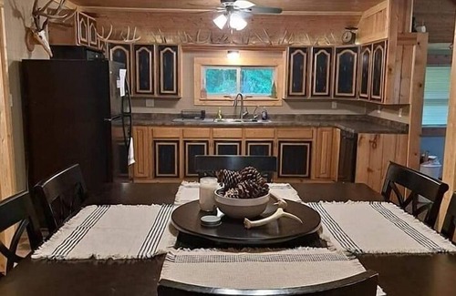 Marshall Cabin | Cabin nestled in the woods for a quiet relaxing getaway with large outdoor deck!