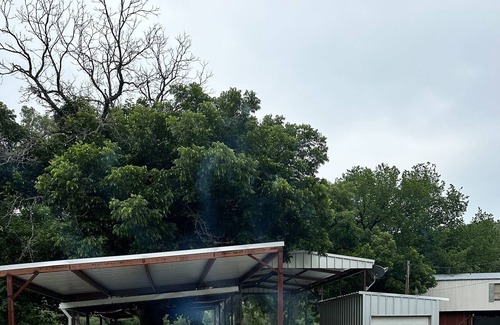 Dennis Cabin | Cabin on the Brazos w/2 50 amp covered Rv spaces.