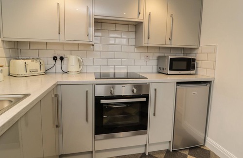 Brough Cottage | CABINTEELY, pet friendly, with open fire in Brough