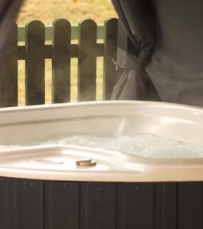 Hendrerwydd House | Caer Fedwen Barns Blodyn Cottage Cosy Self Catering with Private Hot Tub