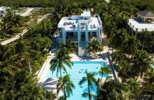Sandy Point House | Calm Waters - A Luxury Beachfront Private Villa. No Crowds. Just Ocean.