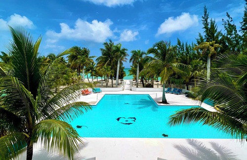 Sandy Point House | Calm Waters - A Luxury Beachfront Private Villa. No Crowds. Just Ocean.