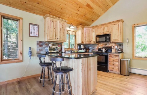 Great Cacapon Cabin | Camp Dancing Bears -riverfront, wifi, fire pit, fireplace, grill, king