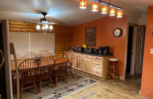 Confluence Cabin | Camp Sideways · Lakeside Cozy Cabin with Fireplace and Hot Tub!