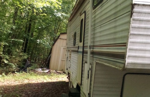 Wake Forest House | Camper off home in wooded property small creek.
