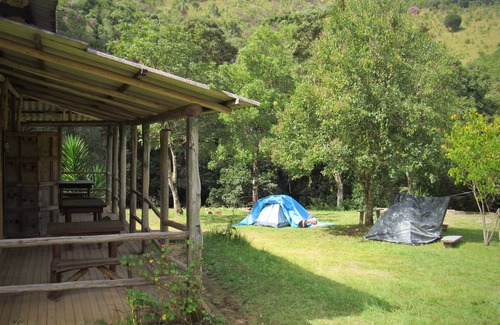 Munhoz RV Rental | Camping area with waterfall and small beach in the Serra da Mantiqueira in Munhoz-MG