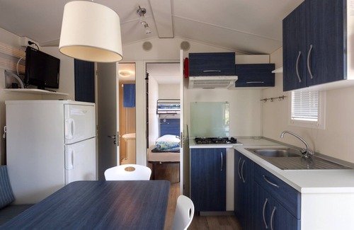 Fertilia House | Camping Village Laguna Blu by Interhome