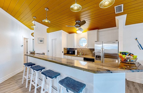 Key Largo House | Canal-front home with private dock, hot tub, water views, kayaks, & deck