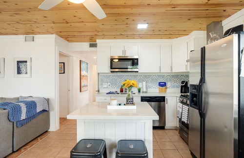 Little Torch Key House | Canal-front Keys escape with amazing view, boat access, firepit, gril, AC, & W/D