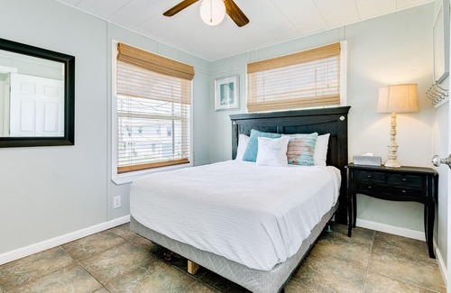 Jamaica Beach Cottage | Canal-View Home w/Shared Pool & Boat Slip, Fish From Deck - Dogs OK