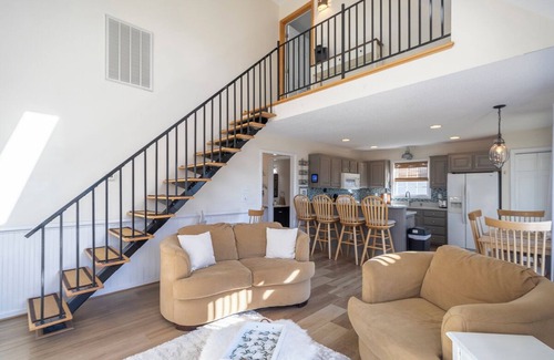 Colington Harbour House | Canalfront home w/wraparound decks and community amenities!