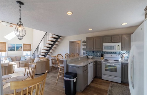 Colington Harbour House | Canalfront home w/wraparound decks and community amenities!