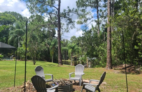 Indian Lake Estates House | Cannon’s Point, Fisherman’s dream, covered boathouse, Wet bar with pool table.
