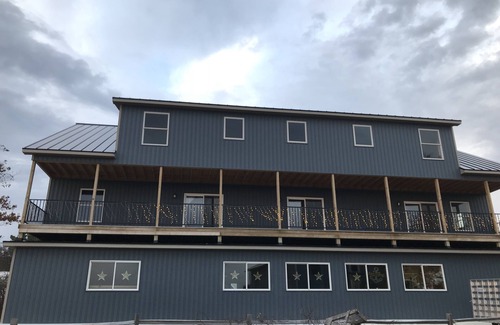 Beaver Island Apartment | Captain's Quarters @The Boat Shop - Overlooking Paradise Bay