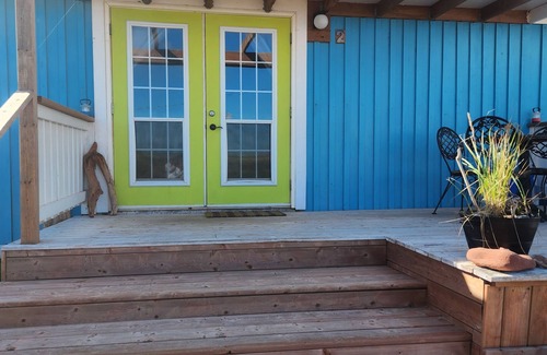 North Lake House | Captain’s Den is our executive blue toned all wooden room with a Captain’s flair