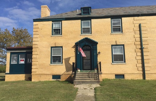 Fort Hancock House | CAPTAIN’S QUARTERS with sunsets views on the bay.