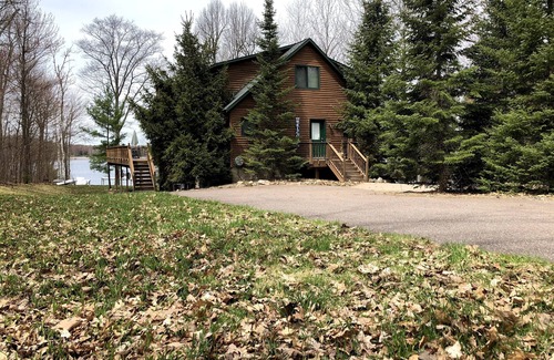 Chief Lake Cabin | Captivating Views of Lake Chippewa from Three Level Chalet Cabin & Lake Home