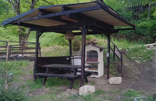 Bene Lario RV Rental | Caravan "Glamping C Selva Tenda Quercia" with Mountain View & Shared Garden