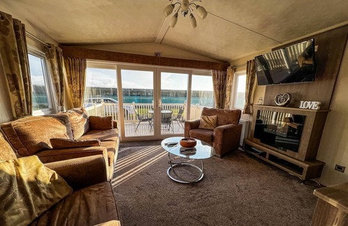 Clacton-on-Sea House | Caravan near the sea front with decking at St Osyth Park in Clacton ref 28005D
