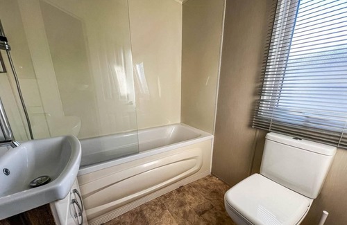 Clacton-on-Sea House | Caravan near the sea front with decking at St Osyth Park in Clacton ref 28005D