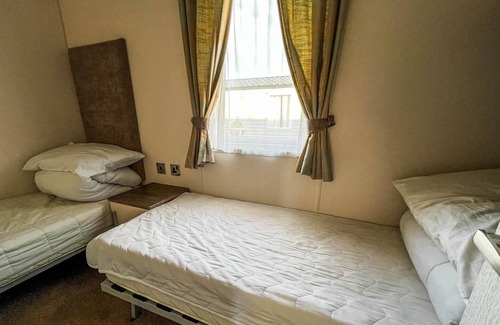 Clacton-on-Sea House | Caravan near the sea front with decking at St Osyth Park in Clacton ref 28005D