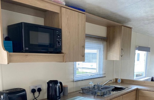 Rhyl Cabin | Caravan With Decking at Lyons Robinhood