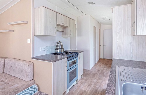 Prestatyn House | Caravan with one double and two twin.